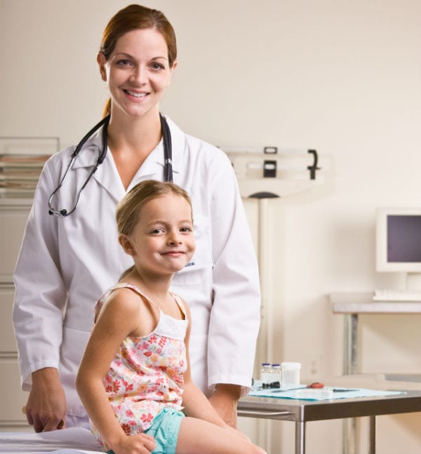 Doctor With Girl Smiling